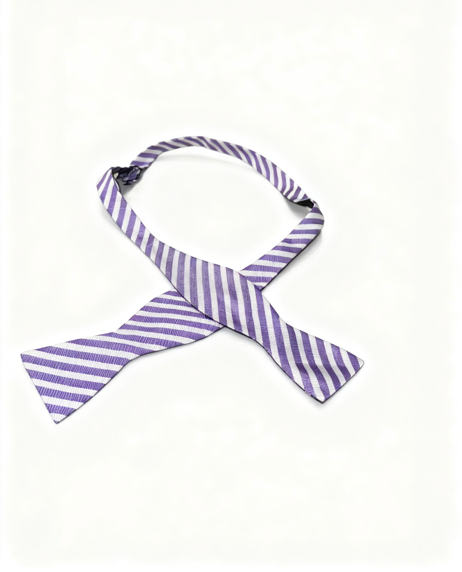 Purple and white striped bow tie 