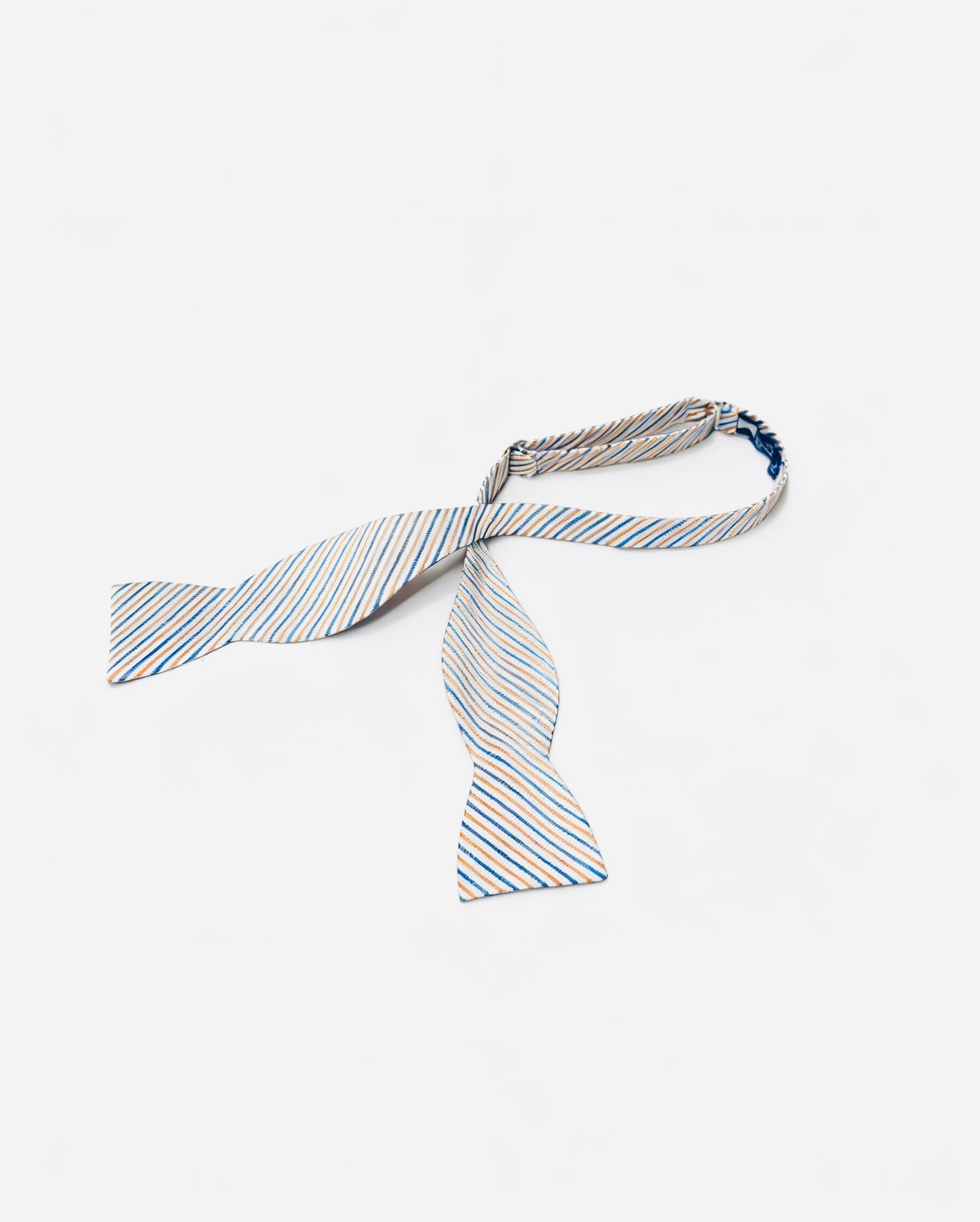 Striped bow tie on a white background